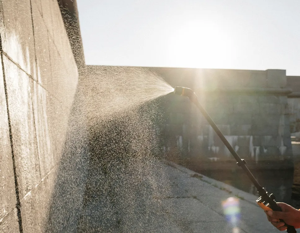 A pressure washer spraying water